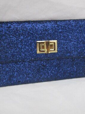 Gorgeous Blue Glitter flat party purse as shown in the photos -preowned used con